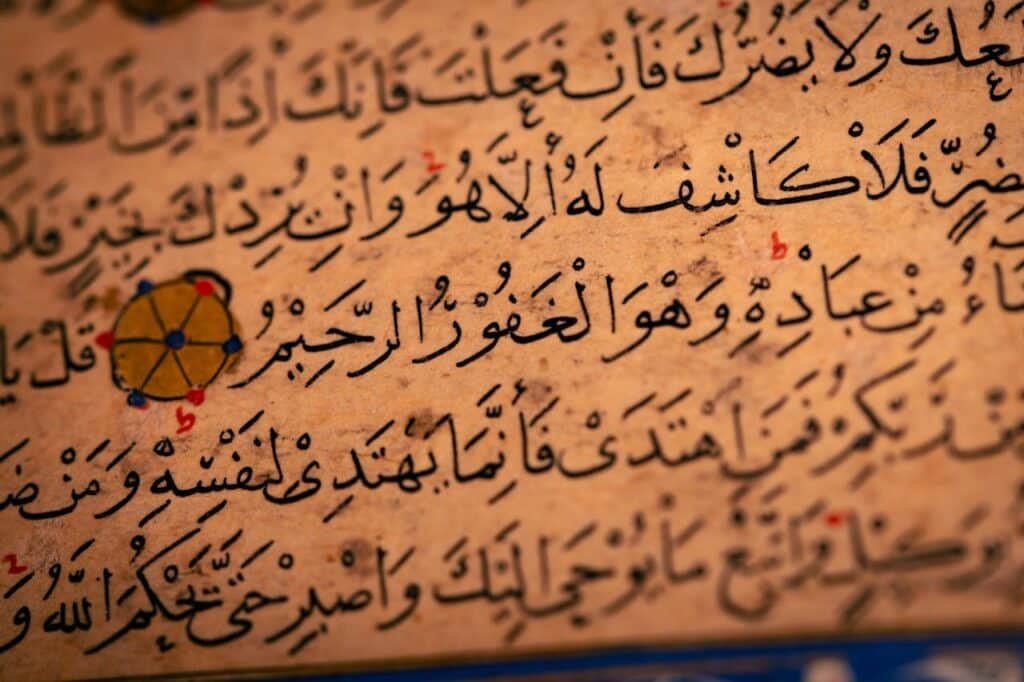 pexels photo 29342502 Detailed close-up of Arabic calligraphy on an ancient manuscript, showcasing historical text.